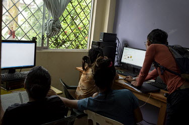 Women living in a shelter for victims of domestic abuse study in their virtual classes with the help of teachers. They have started a school for adult women and many have finished their school studies...