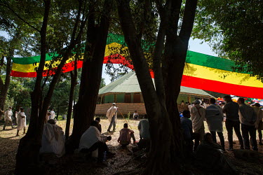 Worshippers gather at Debra Mariam church on Lake Tana to celebrate a special festival holiday to Mariam (Mary). Trees provide shelter for the majority of congregations, the building being set apart f...