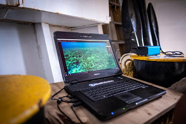 Radio operator Noom Srithanomwong drives a ROV over a seagrass meadow on the Saya de Malha Bank. The Saya de Malha Bank supports the world's largest seagrass meadow, which is also one of the biggest c...