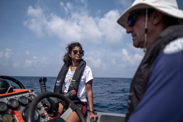 Climate activist Shaama Sandooyea photographed on a RIB while assisting with an eDNA sampling mission on the Saya de Malha Bank in the Indian Ocean.