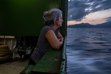 Marine scientist Kirsten Thompson on the poop deck of the Greenpeace vessel Arctic Sunrise in the Seychelles.