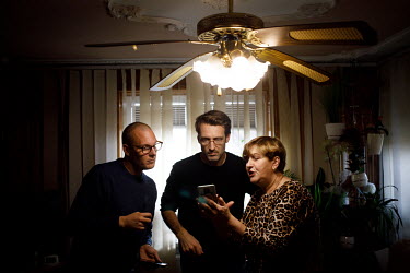 Local resident and councilor Maria Ancipiuk offers assistance to migrants in her home, here talking with Politiken journalist Martin Bjoerck and fixer Grzegorz Sokol. Thousands of migrants attempted t...