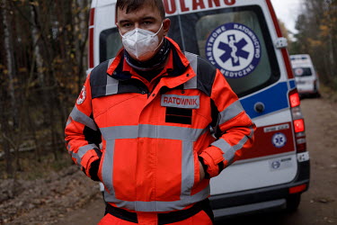 Paramedic at the border helping Syrian refugees.  Thousands of migrants attempted to cross into Europe along the Poland Belarus border in the autumn of 2021. By the last week of October six migrants h...