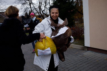 Volunteers from Warsaw and Wroclaw arrive at the Belarusian border with blankets and supplies to help the migrants. Donated supplies are stored at the local fire brigade building.   Thousands of migra...
