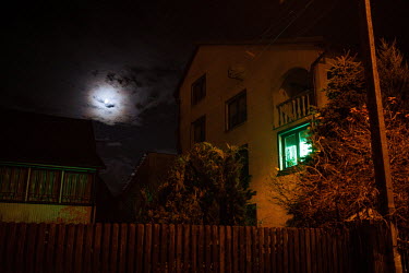 Green light, a signal for migrants who need help, at the house of Maria Ancipiuk in Michalowo. The town is situated near the state of emergency zone by the Belarussian border. Hundreds of migrants, ma...
