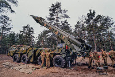 Russian tactical nuclear missile crew on exercise with an R-300 scud class mobile rocket, in a forest approx. 120km south of Leningrad. It has a 300km range and a nuclear warhead that would be used in...