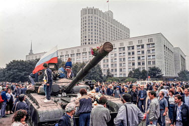 People bring food to tank crews, and climb on their tanks, outside the Russian Parliament in August 1991 following the failed Russian coup. The refusal of tank commanders to fire on the Russian Parlia...