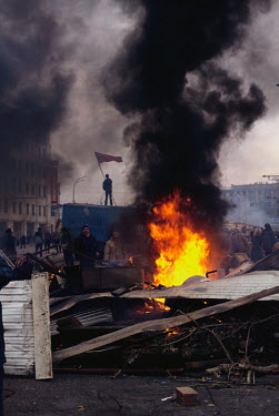 Pro Communist demonstrators set fires and block a major road in central Moscow during the second anti Yeltsin coup attempt.