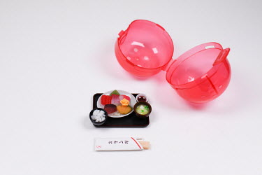 A popular gachapon (capsule toy) range - 'Obontsuki Higawariteishoku', replicas of set meals served in Japanese restaurants as easy working lunches.