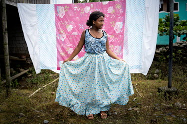 Juleixy Medina, 12, poses for a portrait in her schoolyard in the Afro Ecuadorian community of Playa de Oro. She wants to be a doctor. Juleixy was in her last year of school when on site classes were...