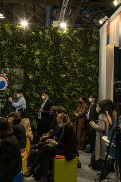 Delegates gather in the Korean stand within the Pavilion hall at COP26 summit, at the Scottish Exhibition Centre in Glasgow, Scotland.