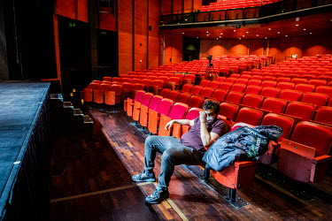 Adrien Laplana, member of Alliance Creative at the end of a series of experimental improvised performances combining acting, music, and drawing, at Theatre Forum Meyrin. The TFM was forced to cancel i...