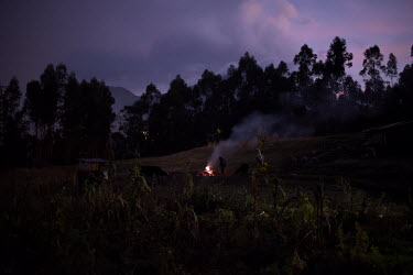 A farmer burns rubbish on his land.