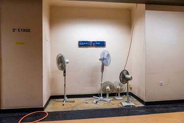 Fans that have been removed from offices in a hallway at the Palais des Nations, the United Nations Office at Geneva, which is being overhauled as part of an $800 million renovaton and construction pr...