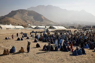 1000 Internally displaced families wait to recieve aid from UNHCR in the form of a cash distribution to help them through the winter. 668,000 people were forced from their homes in Afghanistan since t...