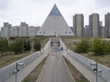 A road leading up to the Palace of Peace and Reconciliation, also called the Pyramid of Peace and Accord, a conference center that houses the triennial Congress of Leaders of World and Traditional Rel...
