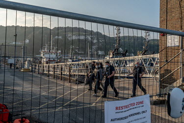 Refugees picked up in the English Channel is brought ashore by Border Force at Dover.