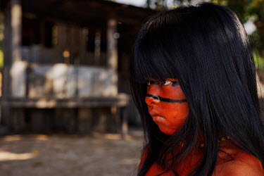A Irantxe Manoki child waits to perform in a traditional dance in an indigenous village in the Irantxe indigenous lands.