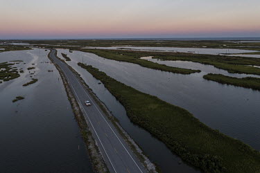 Road connecting the mainland to Grand Isle, a city located on the coast of Louisiana. The city was severely impacted by the passage of Hurricane Ida at the end of August 2021.