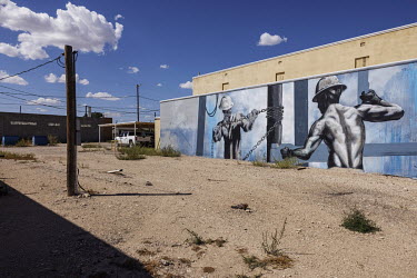 Mural with a drawing about the oil industry on a wall in the city of Rankin, Texas. This region of Texas, called the Permian Basin, is responsible for around a third of all oil production in the Unite...