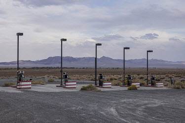 Abandoned gas station along US 95 highway in Nevada. The climate crisis has become a key factor in the emptying of the US countryside.