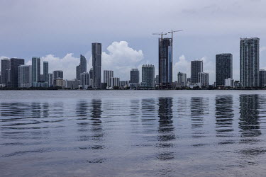 Buildings under construction in downtown Miami, Florida. The 6 million people who live in the state are impacted by almost every natural phenomenon, from rising sea levels to coastal erosion, from hur...