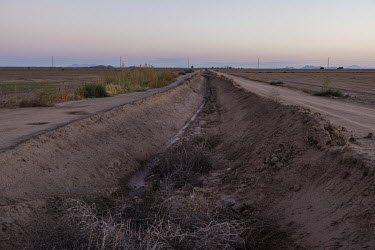 Dry irrigation canal in rural Casa Grande on the outskirts of Phoenix. The severe drought that has hit this region has created a water dispute between urban dwellers and farmers.