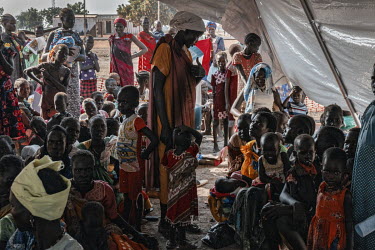 Women and children wait to be seen at camp B, one of the camps with the worst rates of malnutrition amongst under fives. Hundreds of thousands of people have been displaced by flooding which is occurr...