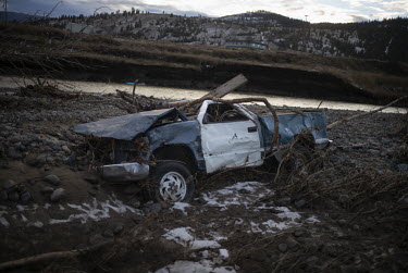 A vehicle half buried by debris in Merritt. Unprecedented rainfall throughout the province triggered landslides and devastating flooding on 14 November 2021, leaving countless people homeless and/or s...