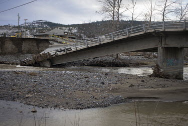 A collapsed road bridge in Merritt. Unprecedented rainfall throughout the province triggered landslides and devastating flooding on 14 November 2021, leaving countless people homeless and/or stranded.