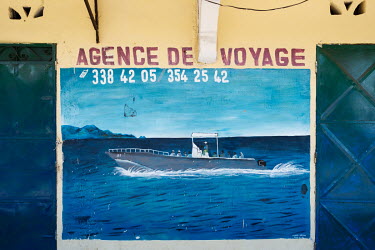 There is a certain irony in a travel agent's sign in Bambao Mtsanga on the island of Anjouan in the Comoros. The area is a known departure point for irregular crossings to the French island of Mayotte...