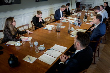 A meeting in the Oak Room of the Prime Minister's Office on the day that Denmark went into lockdown to try and slow the spread of Coronavirus. In the back row from the left, are the Prime Minister's H...