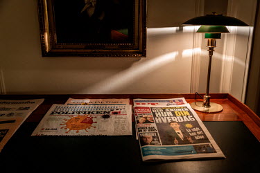 Danish newspapers, laid out in the Prime Minister's office, react to the Coronavirus pandemic and the Danish lockdown.