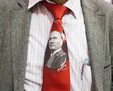 Mustafa Kemal Ataturk's portrait is stitched into the tie of a man at a CHP political meeting.