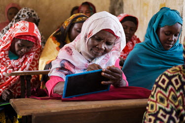 An adult literacy and numeracy class in Hachipenda on the island of Anjouan in the Comoros. Supported by the NGO Initiative Development, the classes aim to provide women involved in the production of...
