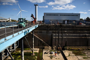 Engineers work on a dry dock used to bring in wind turbine blades, at the Catapult Innovation and Research Centre for Offshore Renewable Energy. The former coal mining area of Blyth in the North East...