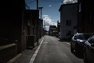 A woman pushes a pram through the once thriving town of Blyth which has become increasingly deprived since the closure of its coal mining industry. The former coal mining area of Blyth in the North Ea...