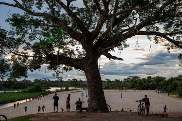 Residents exercise on Daveron beach on the banks of the Paraguay River in Caceres. At this time of year, the Paraguay River usually has a much higher water level, covering this beach.