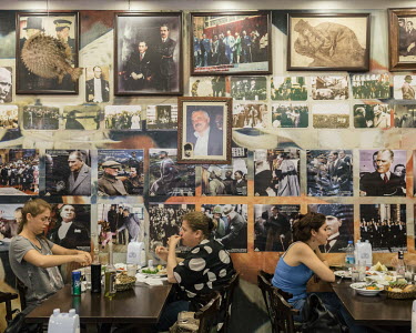 A fish restaurant in the Kadikoy neighbourhood with a wall devoted to images of Mustafa Kemal Ataturk.