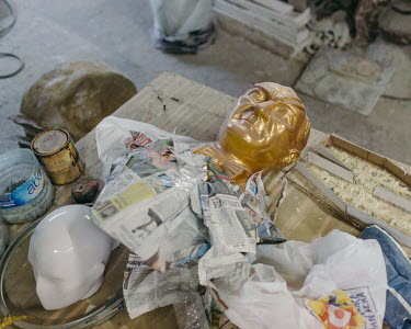 A gold-coloured bust of Mustafa Kemal Ataturk in a small scale workshop in the industrial KagÄ�thane district.