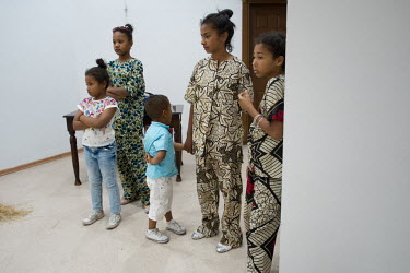 In preparation for the 10th annual Dana Bayram (Calf Festival) held in Izmir, young participants are shown generic African costumes designed by a Turkish costume designer (out of shot)
