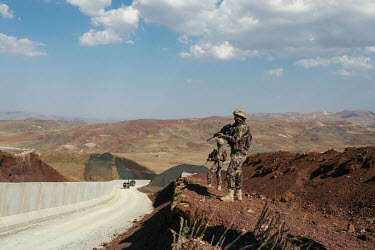 Turkish Jandarma forces operating along a newly constructed border wall which snakes through the mountains along the border with Iran. It has been built as part of an attempt to prevent increasing num...
