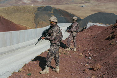 Turkish Jandarma forces operating along a newly constructed border wall which snakes through the mountains along the border with Iran. It has been built as part of an attempt to prevent increasing num...