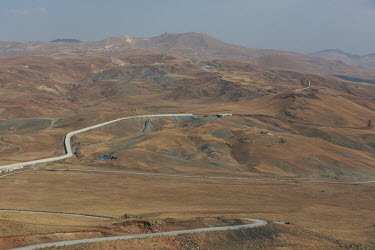 A newly constructed Turkish border wall snakes through the mountains along the border with Iran. It has been built as part of an attempt to prevent increasing numbers of Afghans from illegally crossin...