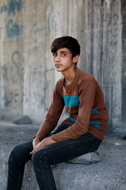 Sharzad (13), from Jalalabad, eastern Afghanistan, standing under a road bridge where he has slept the past nights, out of sight from the Turkish authorities.