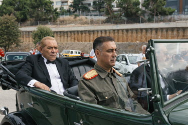 Goksal Kaya (left) works as a professional Mustafa Kemal Ataturk lookalike. Seated in a car from 1931 he starts the Turkish Victory Day motorcade from Maltepe to the Dolmabahce Palace.