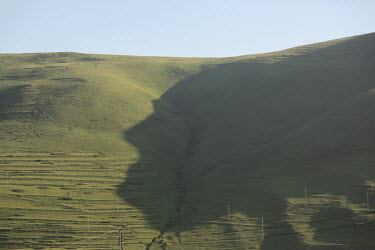 The silhouette of Turkey's founder, Mustafa Kemal Ataturk, on the side of a hill in Ataturk village, near Damal on Turkey's border with Georgia. The silhouette shadow appears for a month each year and...
