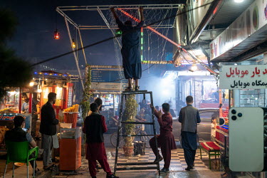 Stalls open at night in Shahr-e Naw.