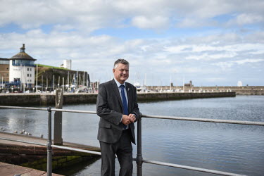 Conservative party MP and Mayor of Whitehaven, Mike Starkie, at the harbour in Whitehaven where plans for a new coal mine on the site of a former chemical company have caused controversy. West Cumbria...