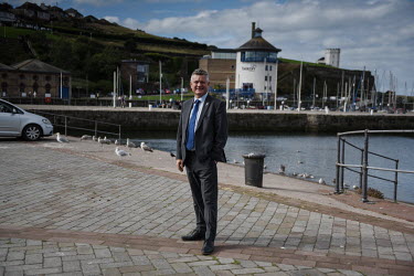 Conservative party MP and Mayor of Whitehaven, Mike Starkie, at the harbour in Whitehaven where plans for a new coal mine on the site of a former chemical company have caused controversy. West Cumbria...